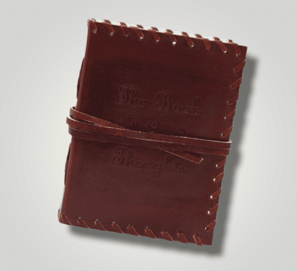 Carnet en cuir avec lanière