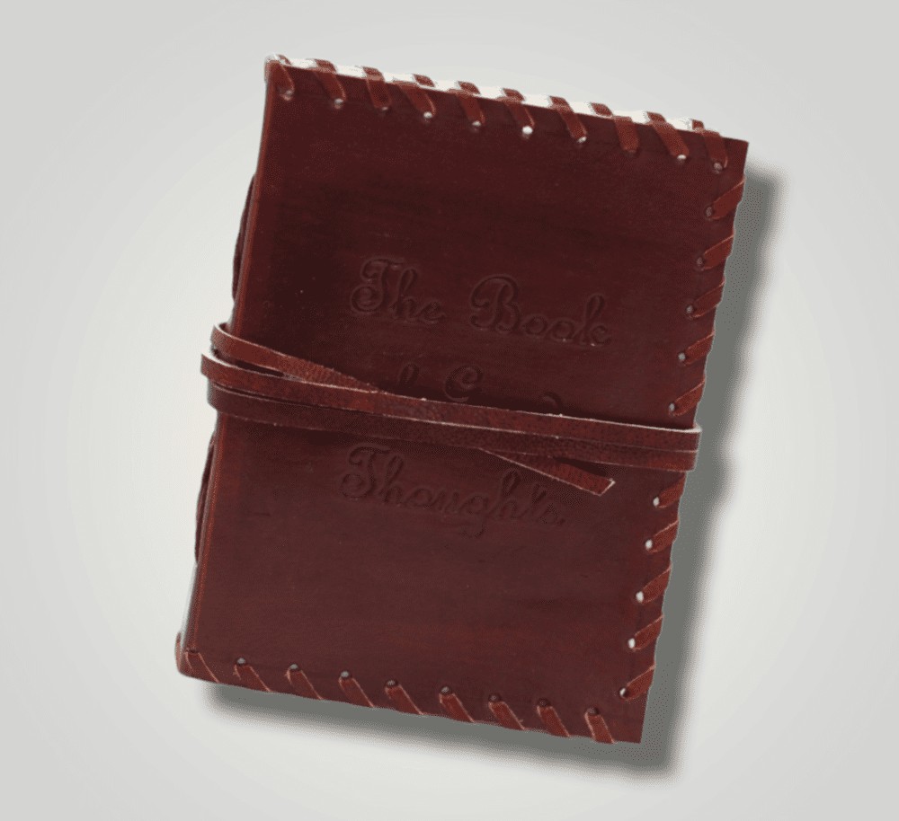 Carnet en cuir avec lanière